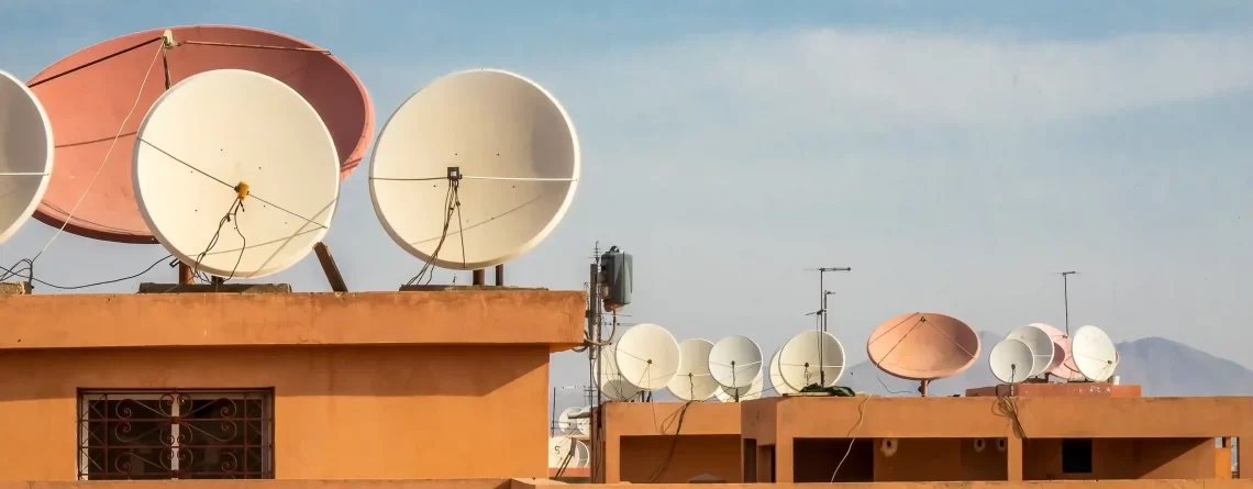 1 wide-angle-shot-white-satellite-dishes-roof-building